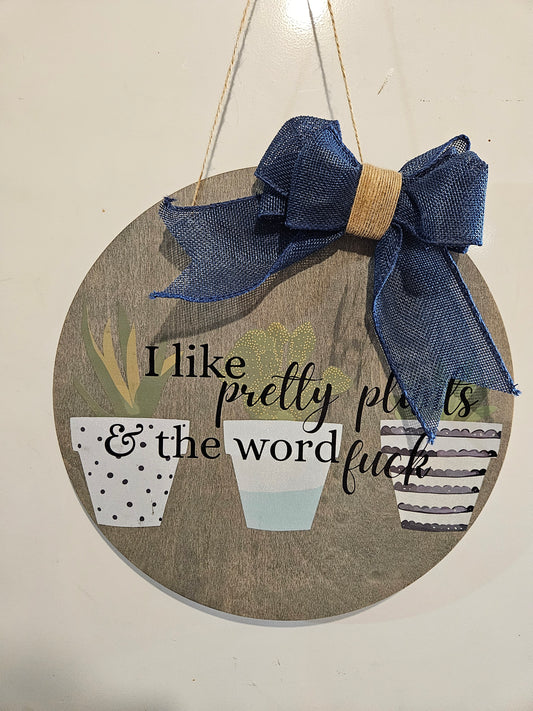 12" Circle Wood Sign "I like Pretty Plants, and the word Fu*k"
