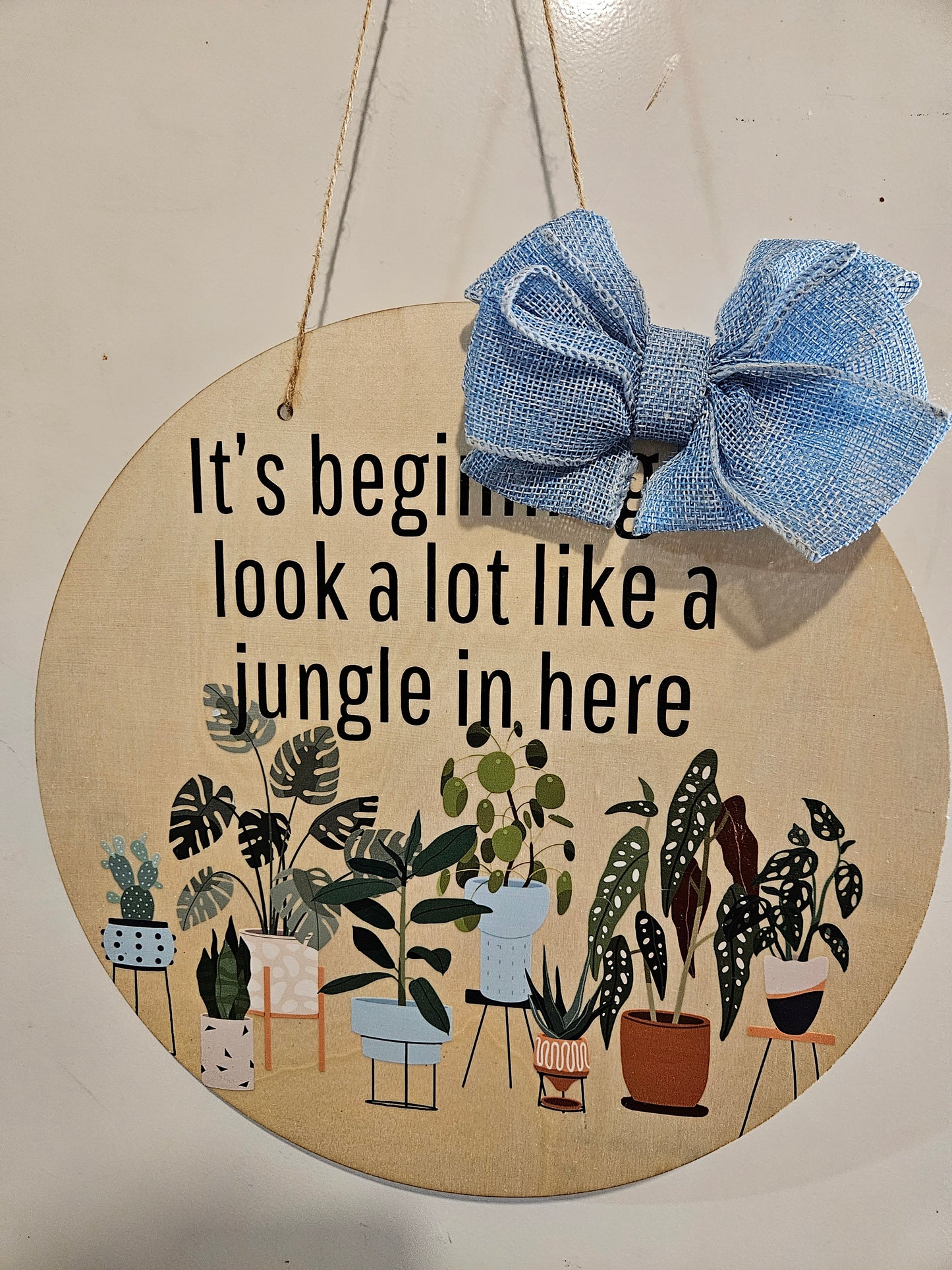 12" Circle Wood Sign "It's beginning to look a lot like a jungle in here"